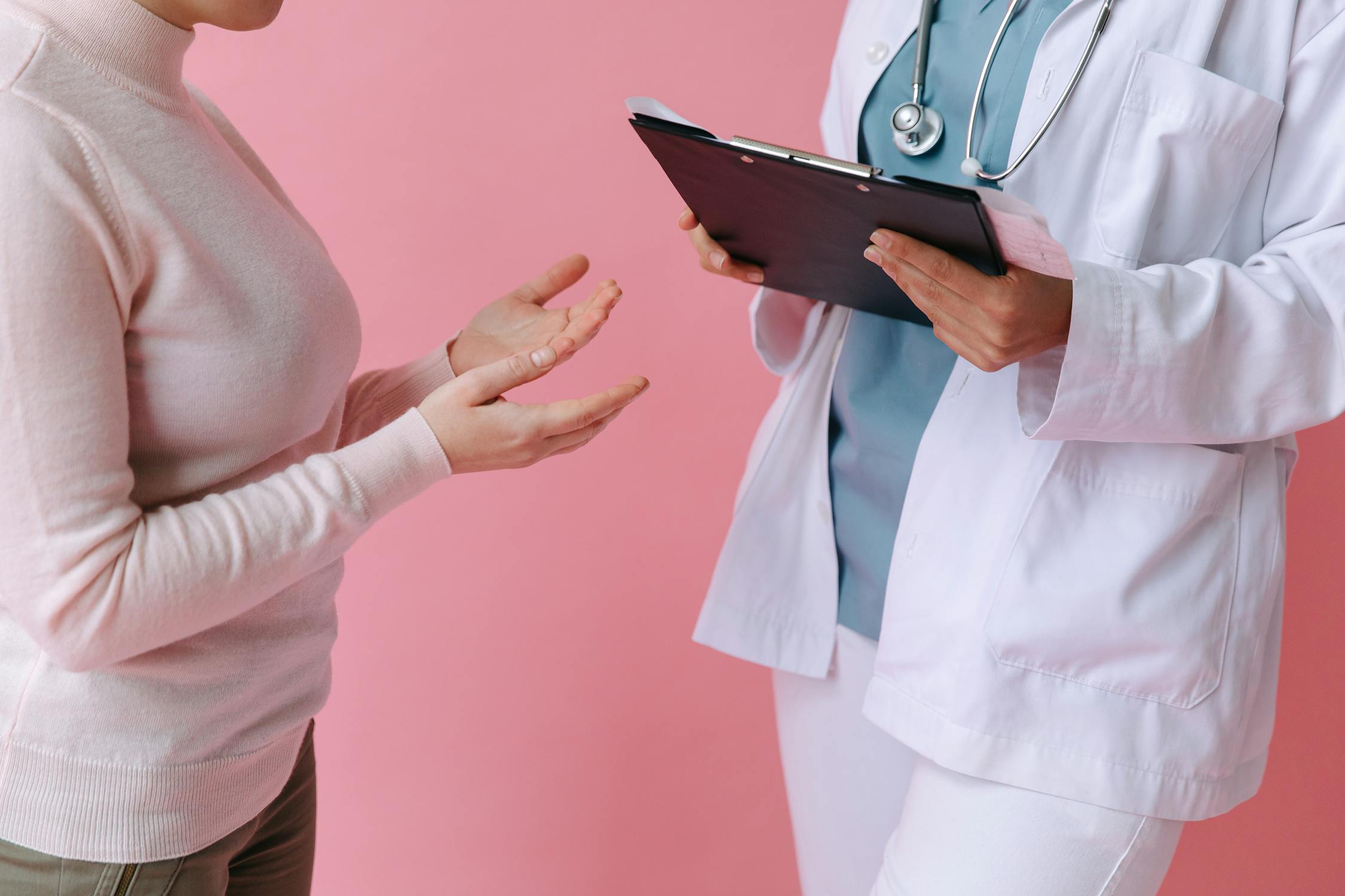 Doctor consulting with a patient in a warm, welcoming clinic office